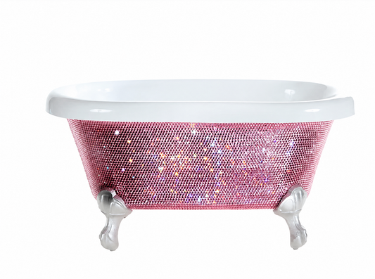 Pink glittery bathtub with silver legs on a white background