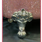 Tiny bathtub close up of metal foot