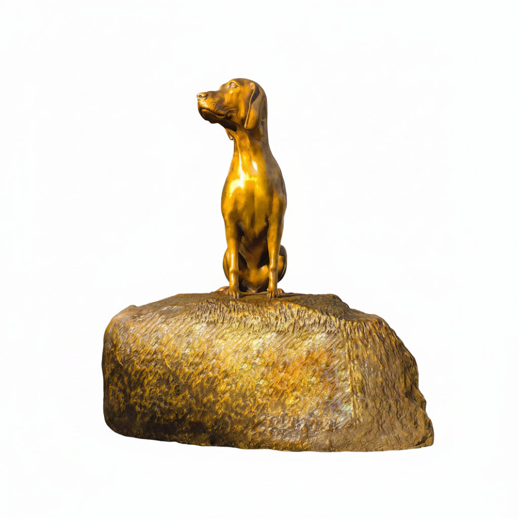 Bronze statue of a dog on a white background