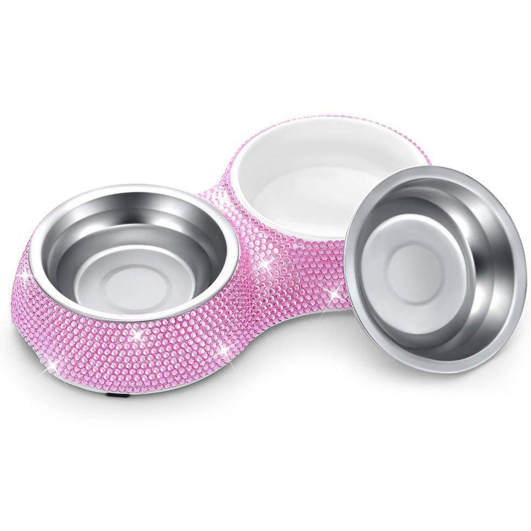 Pink blinged-out pet bowl with silver interior on a white background