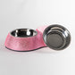Pink blinged-out pet bowl with a silver interior on a white background